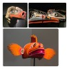 3 masques très colorés de l'esposition  Premières Nations. Arts et cultures du Nord-Ouest de l'Amérique.